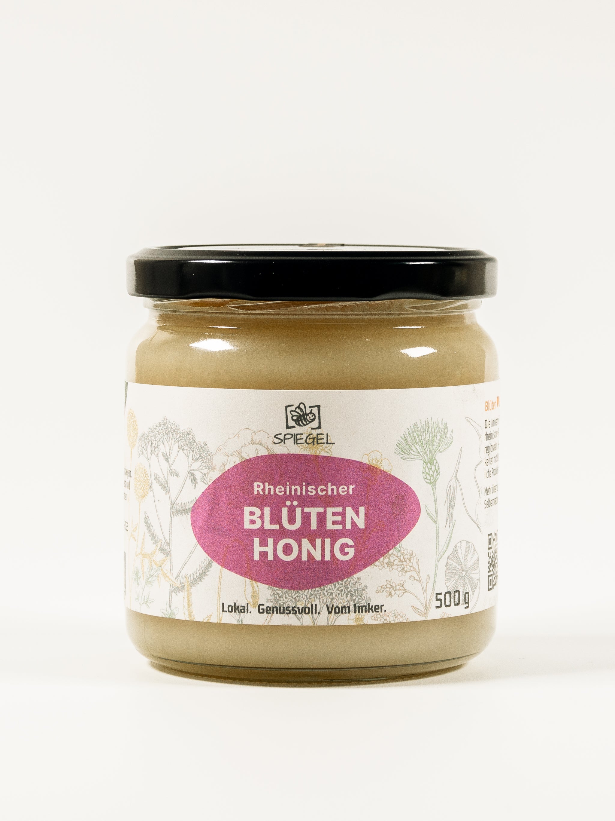 Glas rheinischer Blütenhonig der Imkerei Spiegel Düsseldorf mit Etikett mit stilisierten Wildblumen.